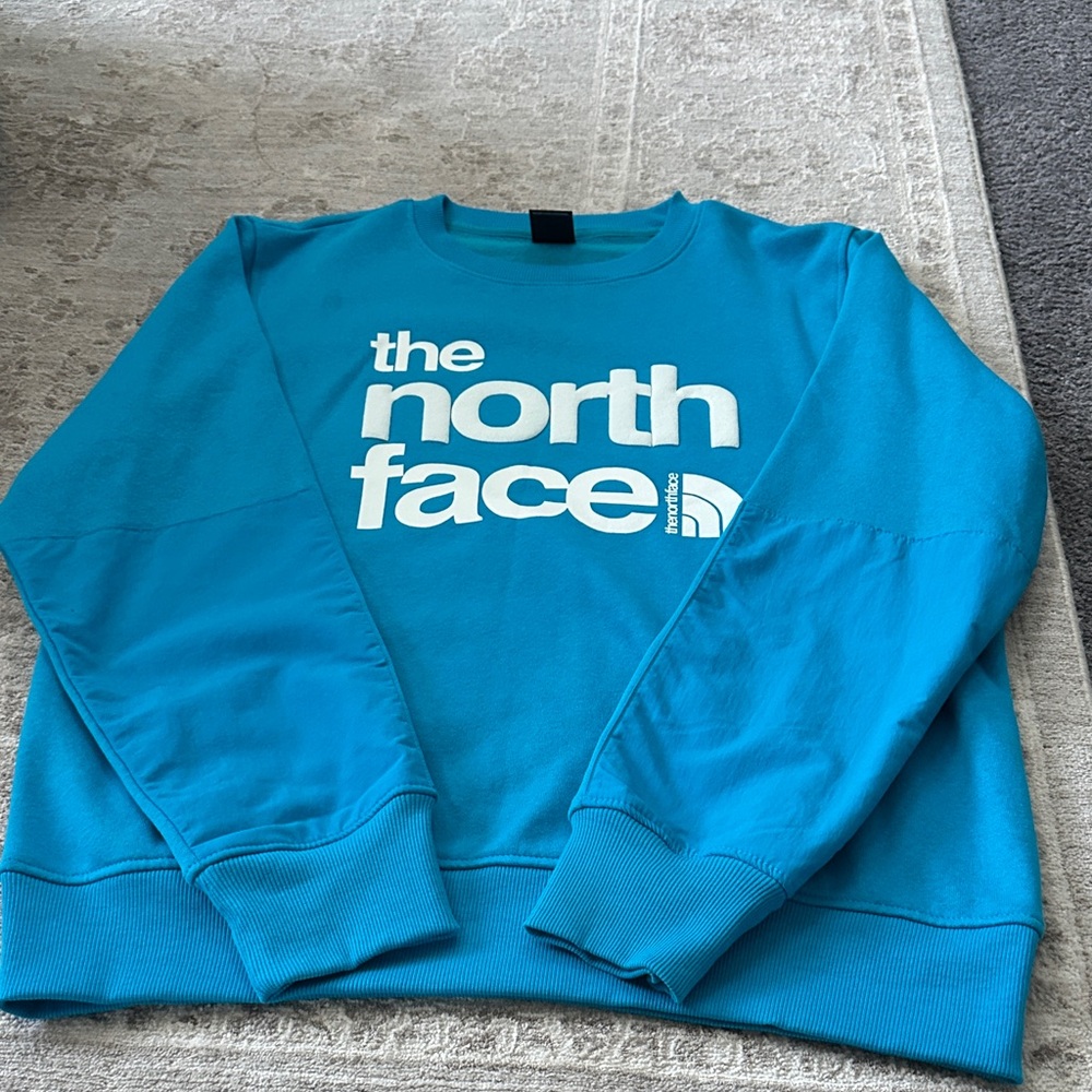 The North Face Men's Medium Vibrant Blue Sweatshirt.